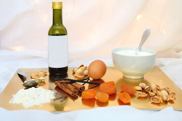 Ingredients for a peach and pistachio cake. Festive holiday background. Selective focus.