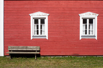 Two Windows And A Wooden Bench