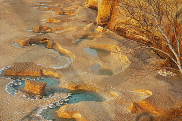 Winter landscape of the frozen shoreline of Lake Superior covered with sand, Pictured Rocks National Lakeshore, Michigan's Upper Peninsula, USA