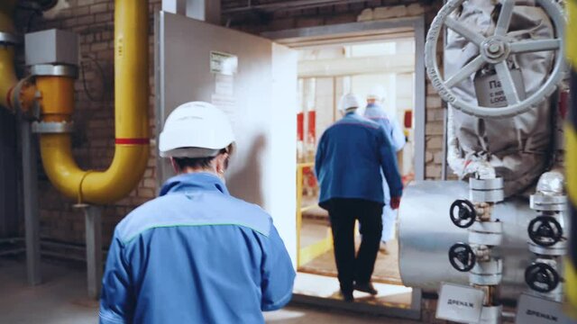 Workers go inside the production of highly efficient chemical products of deep processing