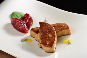 Fine dining, Roasted foie gras with cherry sauce on the plate