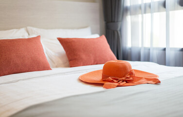 Orange pillows on the bed