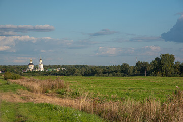 Orthodox church in the field in summer
