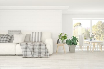 Stylish room in white color with sofa and autumn landscape in window. Scandinavian interior design. 3D illustration