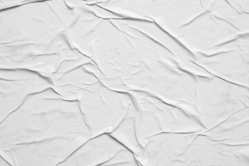 Blank white crumpled and creased paper poster texture background