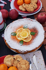 Christmas pie, cocoa with marshmallows and table. Christmas tree background. Van mobile trailer, mobile home, terrace. New Year celebration. Winter holidays. Christmas morning.