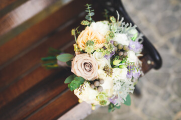 Beautiful wedding bouquet with different flowers, roses