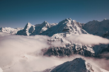 amazing snow covered peaks in the Swiss alps Jungfrau region from Schilthorn