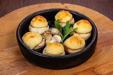Baked champignon staffed with cheese