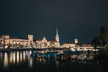 scenic view of historic Zurich city center with famous Fraumunster and Grossmunster Churches and river Limmat at Lake Zurich, Canton of Zurich, Switzerland