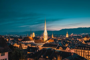 Fototapeta na wymiar zurich skyline with church steeples at night Switzerland