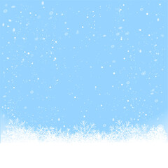 Christmas snowfall from blue sky background