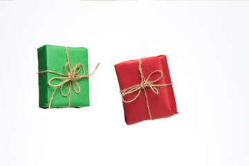 Woman's hands and five vintage minimalistic Christmas gift boxes