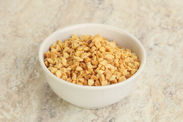 Crunched roasted peanut in the bowl
