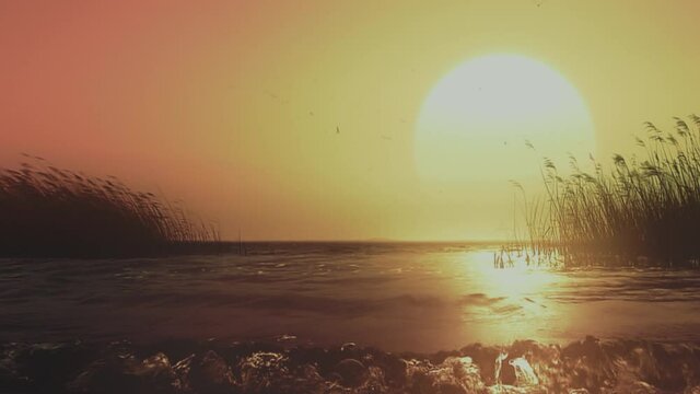 Giant yellow sun reflecting in the waters of lake or sea. Scenic romantic background.
