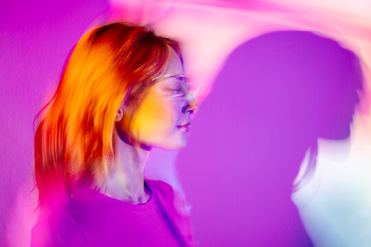 Young Woman With Led Glasses Eyes In Studio - Powered by Adobe