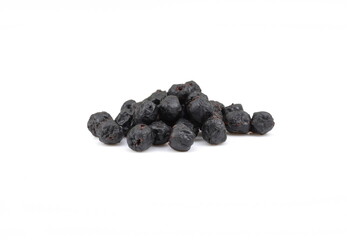 Dried aronia berries isolated on white background