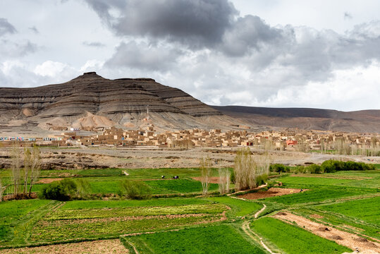 Images of Morocco. A view of Agoudal, the highest village in Morocco, with the cultivated fields in the foreground and the high Atlas mountains in the background