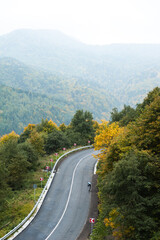 Asphalt road in the autumn mountain