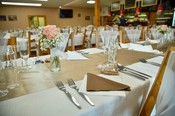 Wedding table setting with bistro lights.