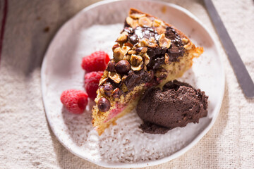 Hazelnut chocolate cake with raspberries and chocolate mousse 