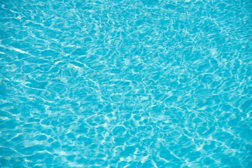 Water in swimming pool, background with high resolution. Wave abstract or rippled water texture.