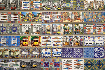 Colorful magnetic souvenirs of Lisbon with the famous yellow tram and Azulejos tiles