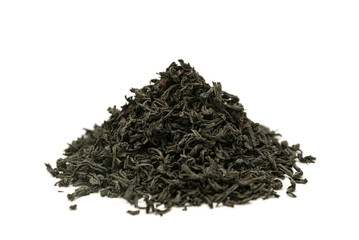 Heap of dried black tea on a white background