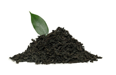 Heap of dried black tea on a white background