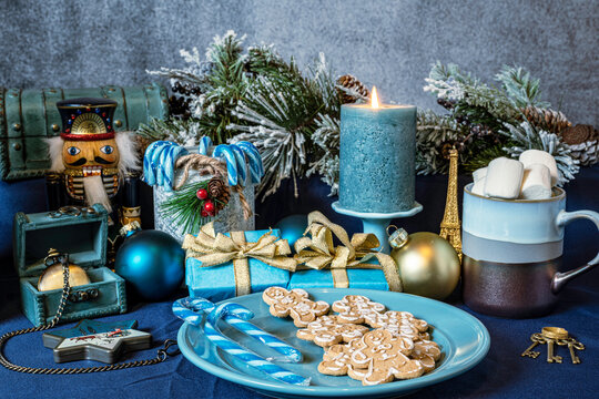 Blue Christmas With Candy Canes Gingerbread Cookies Marshmallows Blue Presents Nut Cracker On Blue