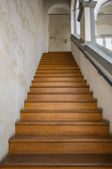 Fototapeta na wymiar Old style building brown wooden stairs