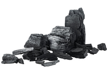 Pile of natural wood charcoal isolated on a white background. Pieces of charcoal. Traditional charcoal.
