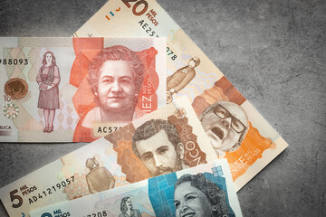 Colombian money, various banknotes filling the frame