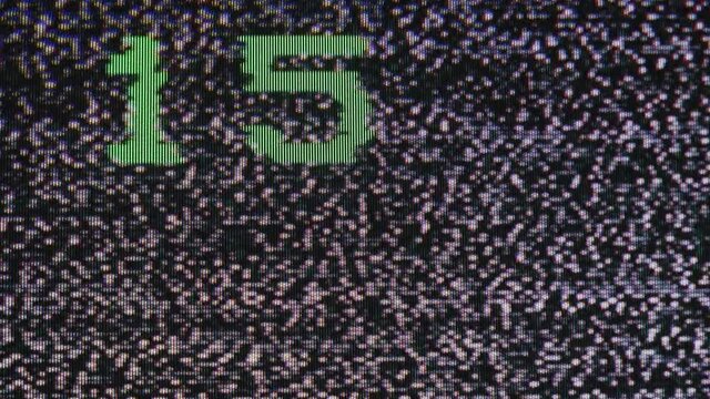 Tv Noise Channels zapping no signal front macro
The television is in front and the channels change without finding a signal. You see the noise on the screen and the numbers that go from 2 to 69. Loop