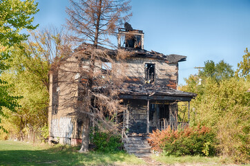 Burned Out House With Tree