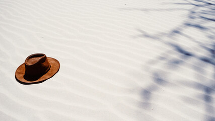 Flat Brimmed Fedora Hat on sand dunes
