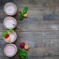 Chia pudding in glass with raspberry . Breakfast yogurt. Frame. Top view