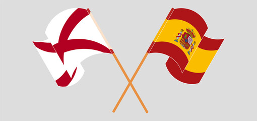 Crossed and waving flags of The State of Alabama and Spain
