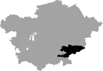 Black Map of Kyrgyzstan inside the gray map of Central region of Asia