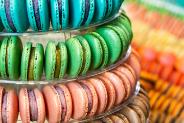 Colorful delicious French macarons pyramid for the candy bar for wedding or happy birthday party, st Valentines day, 8 march, international women day, Mother Day.