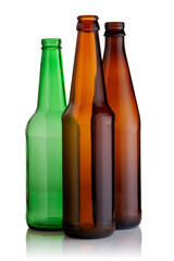 Three glass empty beer bottles