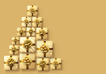 Yellow gift boxes with golden bows like triangle Christmas tree.
