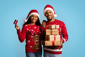 Positive black lovers buying xmas gifts online