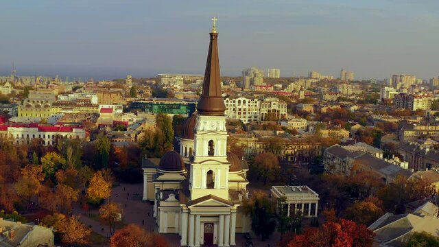 Video with autumn panorama the city center with Orthodox Cathedral in Odessa, Ukraine. Drone footage, sunset.