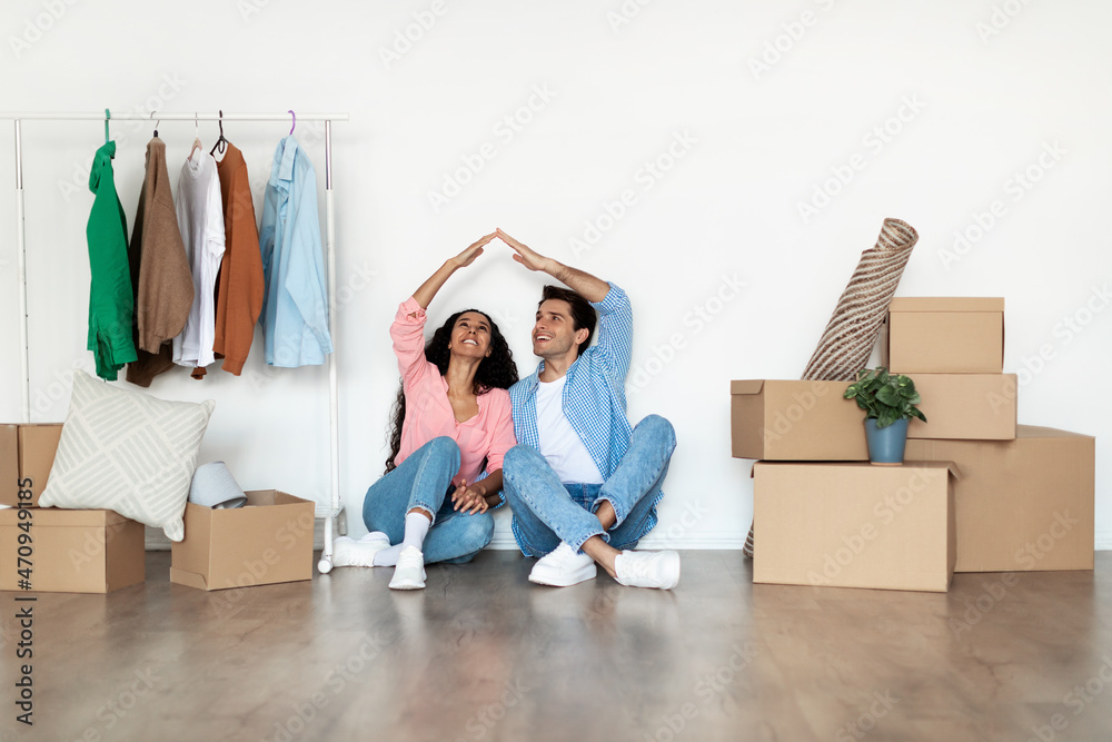 Sticker happy man and woman making symbolic house roof with hands