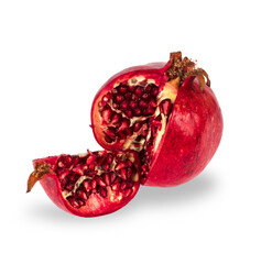 Ripe pomegranate fruit cut into pieces on white background isolated
