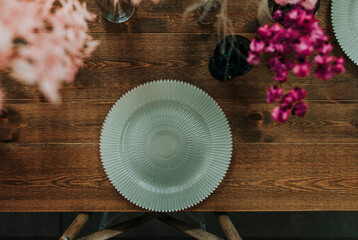 wedding reception table setting decorated with flowers and candles 