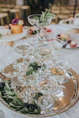 wedding reception table setting decorated with flowers and candles 