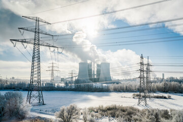 Nuclear power plant and power lines in winter