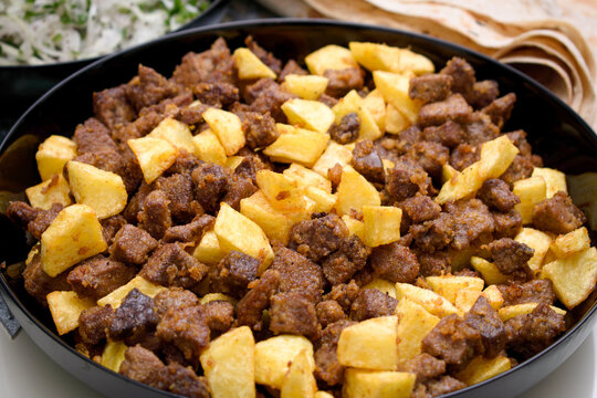 A dish made with beef liver and french fries in Turkish cuisine. its name is arnavut cigeri